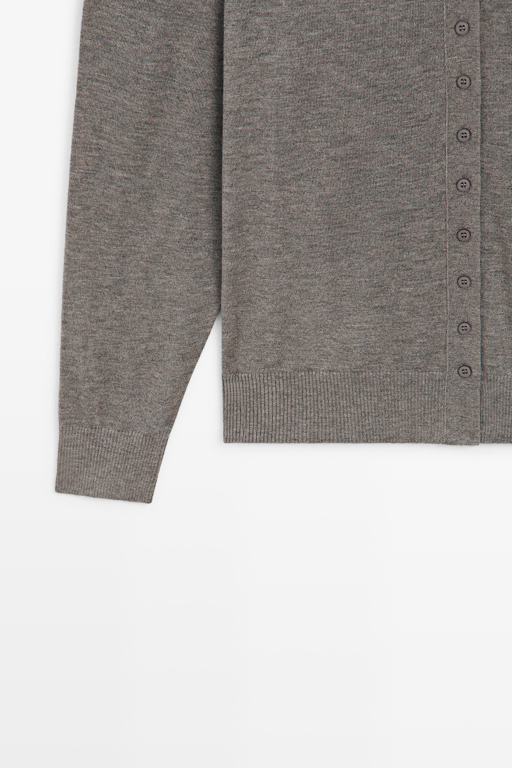 Turtleneck cardigan with button detail